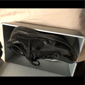 Black patent leather Prada sneakers